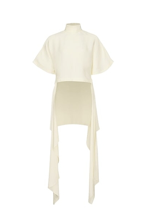 ALAÏA Asymmetric Top in Blanc Creme - White. Size 38 (also in 34, 40).
