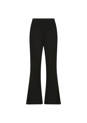 Izaak Azanei ribbed-knit flared trousers - Black