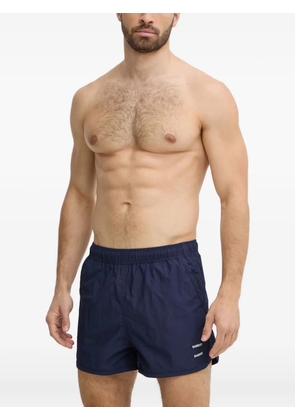 SAMSOE SAMSOE logo-print swim shorts - Blue
