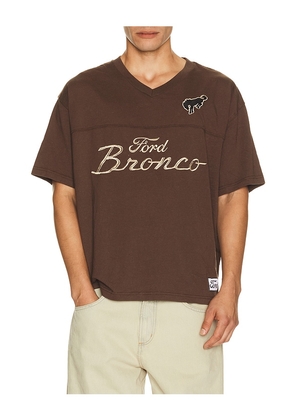 Junk Food Ford Mustang Soccer Jersey in Brown. Size S. Also in M, L, XL/1X.