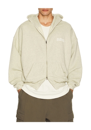 Fear of God ESSENTIALS 90's Zip-Up Hoodie in Cream. Size XS. Also in S, M, L, XL/1X, XXL/2X, XXXL/3X.