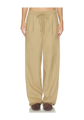Fear of God ESSENTIALS Pleat Front Drawstring Pant in Brown. Size XS. Also in S, M, L.