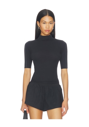 NikeSKIMS Weightless Short Sleeve Top in Black. Size XS. Also in S, M, L, XL.