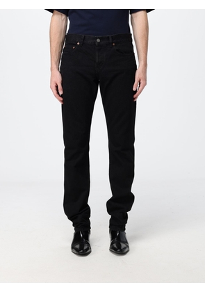 SAINT LAURENT Pants Men color Black