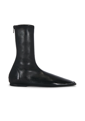 KHAITE Marlene Boot in Black - Black. Size 36.5 (also in 36, 37.5, 38, 38.5, 39, 39.5, 40, 41).