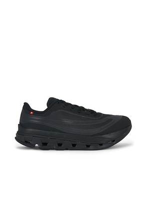 On Cloudflow 5 Ad in Black & Magnet - Black. Size 11.5 (also in 7, 7.5, 8, 8.5, 9, 9.5, 10, 10.5, 11, 12, 13).