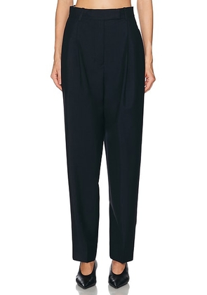 Rohe Daria Single Pleat Tapered Trouser in Navy - Navy. Size 38 (also in 34, 36, 40).