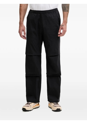 Mammut logo-embroidered panelled trousers - Black
