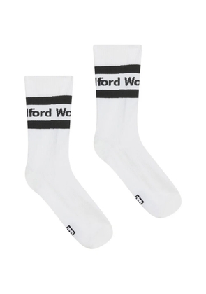 Wolford logo-knit ribbed socks - White