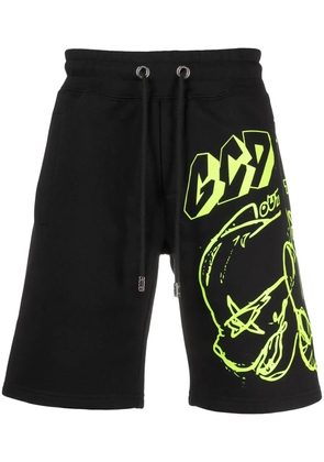 GCDS graffiti print track shorts - Black