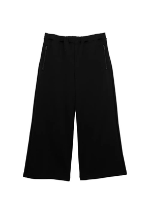 Black Comme Des Garçons wide-leg track pants