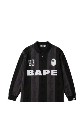 A BATHING APE® striped logo-print polo shirt - Black