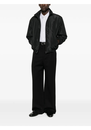 Saint Laurent pressed-crease wide-leg trousers - Black