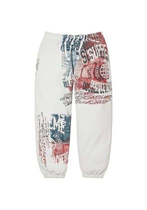 Supreme graphic-print track pants - White