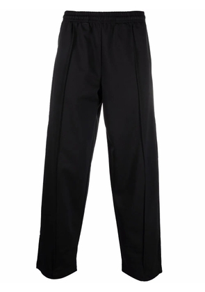 COUNTY OF MILAN Cross logo track pants - Black