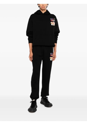 Melt graphic-print track pants - Black
