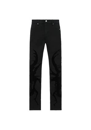 RTA Bryant beetle-print jeans - Black
