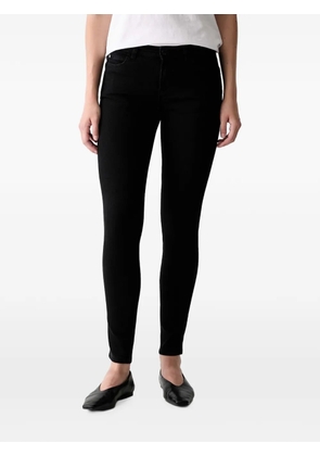 GUESS USA logo-patch skinny jeans - Black