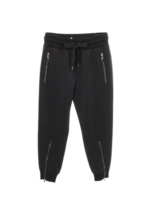 Dolce & Gabbana Pre-Owned 2020s logo-plaque track pants - Black