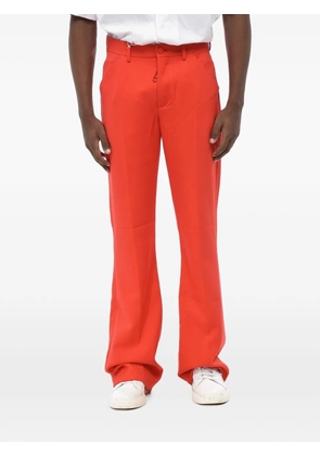 Off-White logo-print bootcut trousers - Red
