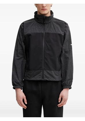 The North Face check-pattern panelled jacket - Black