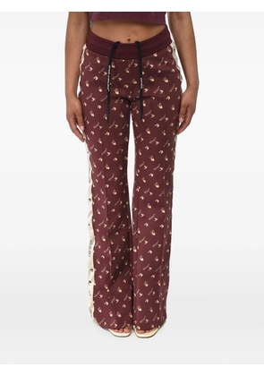 Off-White monogram fabric track pants with contrast side stripes - Red