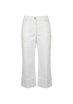 Valentino Garavani floral-applique cropped jeans - White