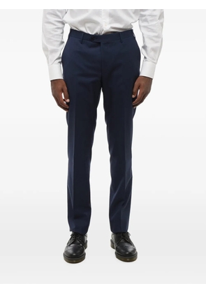 Corneliani pressed-crease virgin-wool trousers - Blue