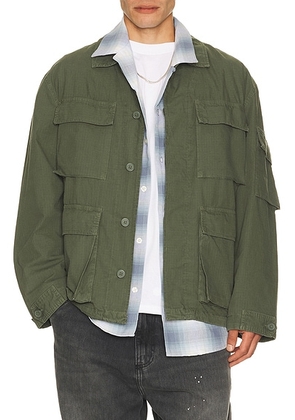 Carhartt WIP Manderson Jacket in Leaf (Garment Dyed) - Green. Size L (also in S, M, XL/1X).