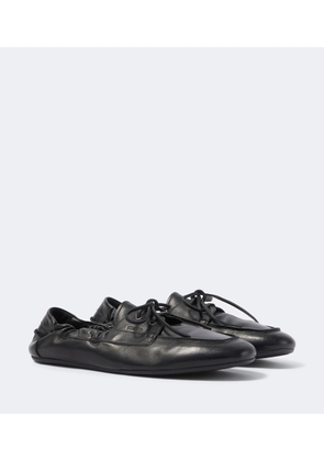 Prada Shuffle leather loafers