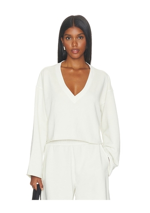 Beyond Yoga Fade Out Cropped Long Sleeve in Ivory. Size S. Also in L, M.