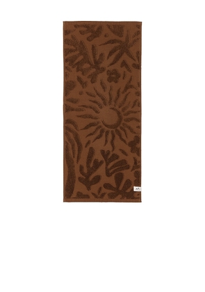 Slowtide Sunny Sculpted Hand Towel in Brown.