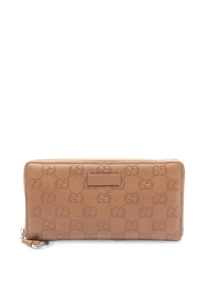 Gucci Pre-Owned 2010s Guccissima zip-around wallet - Neutrals