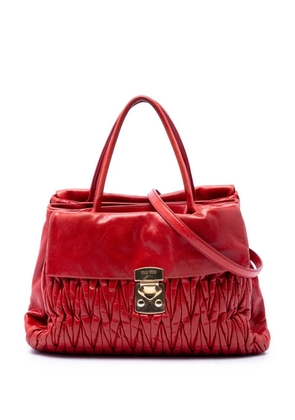 Miu Miu Pre-Owned 2010-2026 Matelasse Nappa Lux Bauletto Convertible Handbag satchel - Red
