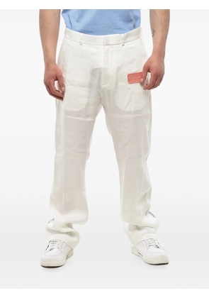 Off-White logo-patch linen-blend trousers