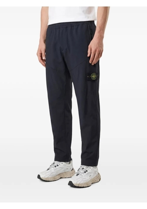 Stone Island Compass-motif track pants - Blue