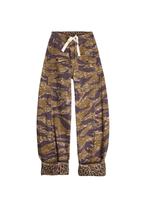 R13 reversible leopard-stripe trousers - Green