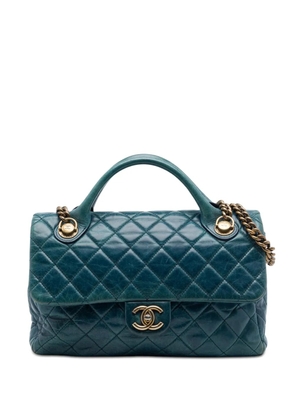CHANEL Pre-Owned 2014 Medium Glazed Calfskin Castle Rock Top Handle Flap satchel - Blue