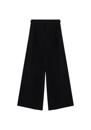 SIMKHAI Leroy pleated wide-leg trousers - Black