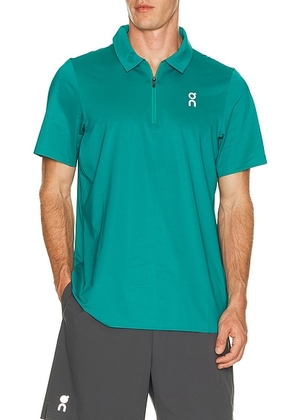 On Court Polo in Neem - Green. Size L (also in XS, S, M, XL/1X, XXL/2X).