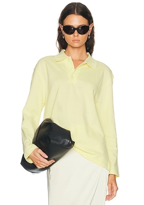 FLORE FLORE Diana Polo Top in Camomile - Yellow. Size L (also in XS, S, M).