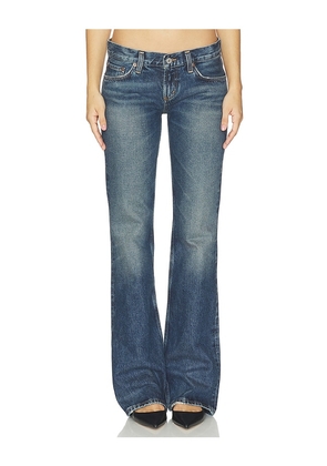 AGOLDE Low Rise Boot Jean in Blue. Size 23. Also in 24, 25, 26, 27, 28, 29, 30, 31, 32, 33, 34.