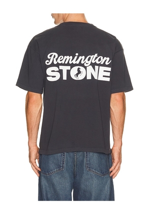 Remington Stone Stack Tee in Black. Size S. Also in M, L, XL/1X.