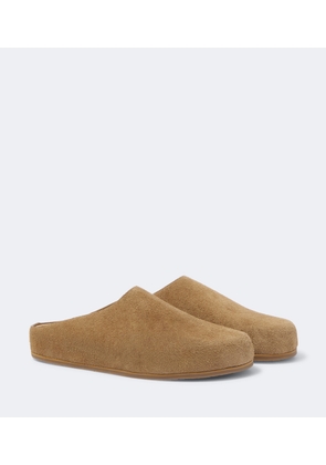Studio Nicholson Wearing suede mules