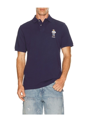 Polo Ralph Lauren Novelty Denim Bear Polo in Blue. Size S. Also in M, L, XL/1X, XXL/2X.