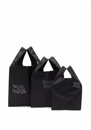 Black Comme Des Garçons set-of-three slogan-print tote bags