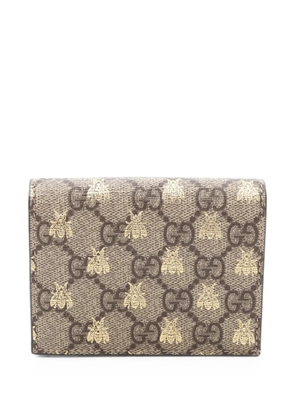 Gucci Pre-Owned 2010s GG Supreme Bee bi-fold wallet - Neutrals