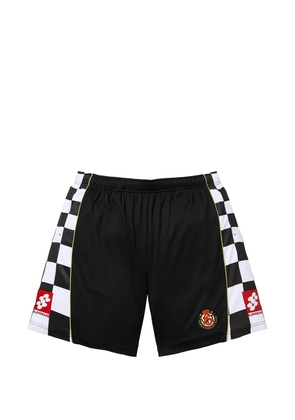 Supreme checkerboard-print soccer shorts - Black