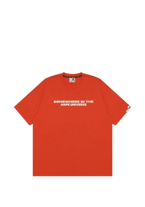 AAPE BY *A BATHING APE® AAPEUNVS graphic-print T-shirt - Orange