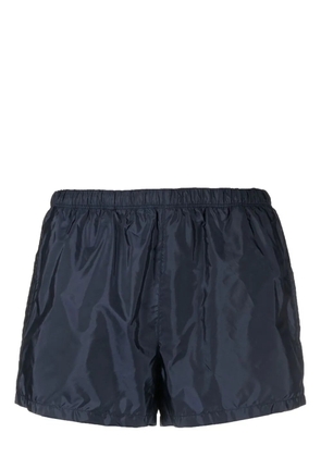 Prada logo-plaque pocket swim shorts - Blue